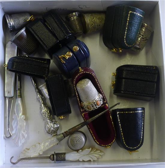 Various cased thimbles and other sewing impliments